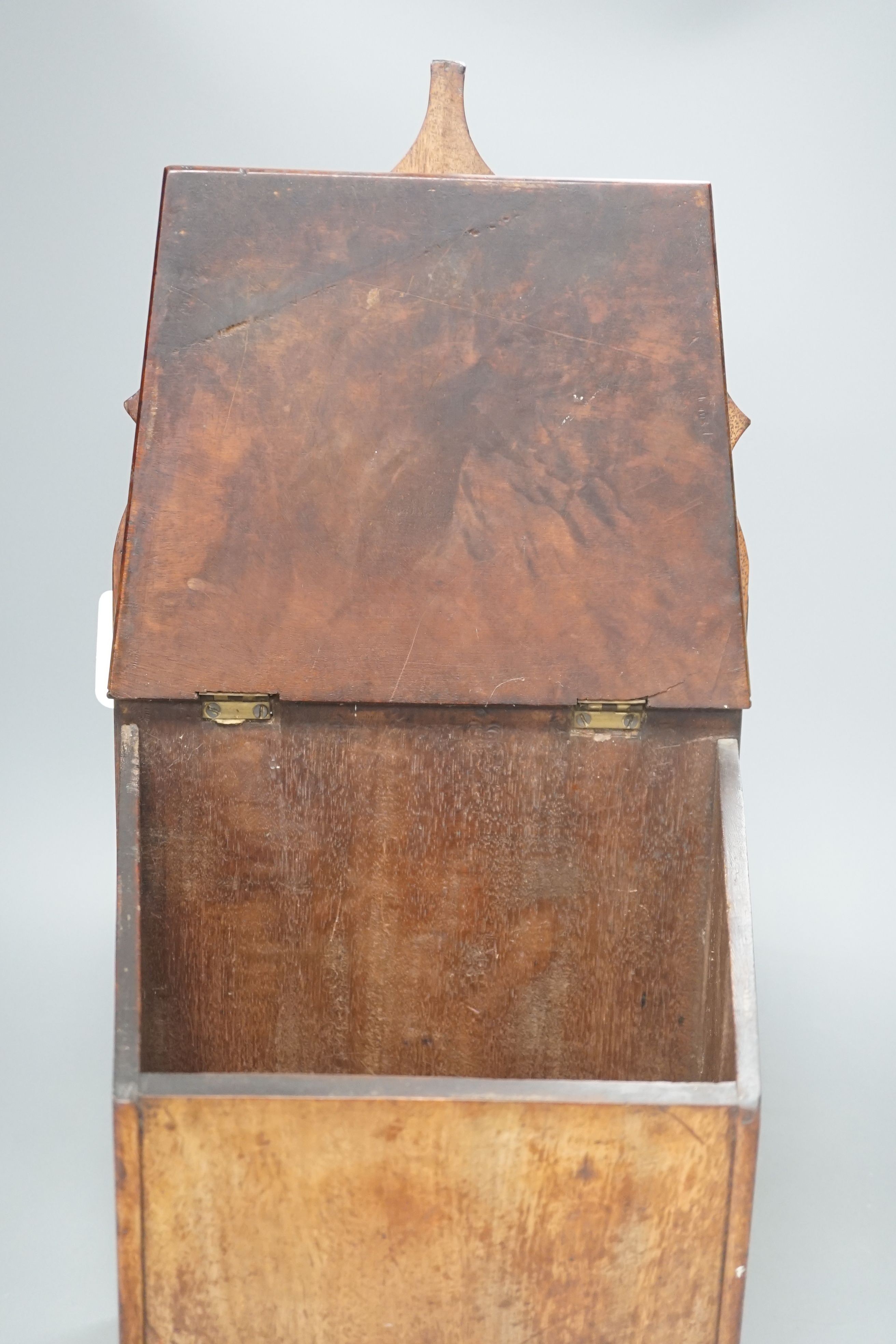 A George III mahogany salt box, 49.5 cms high.